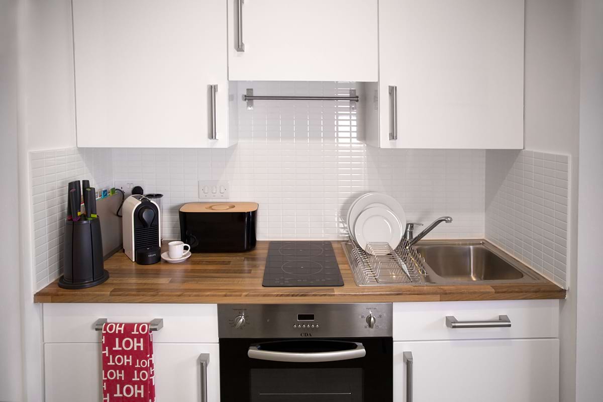 Kitchen cupboards, over and hob at CODE Harper Road, Student Accommodation in Coventry