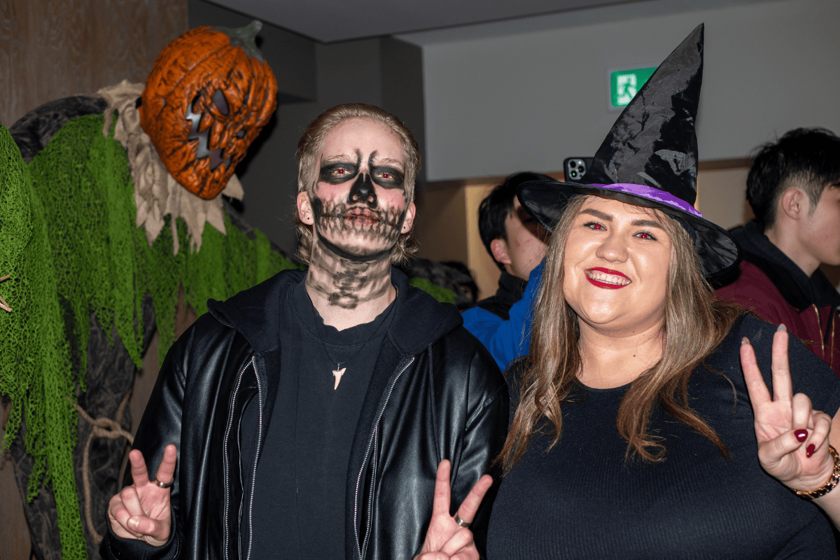 Two Students in a Skeleton costume and a witch costume