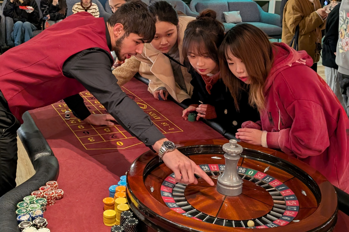 Casino host point to roulette wheel