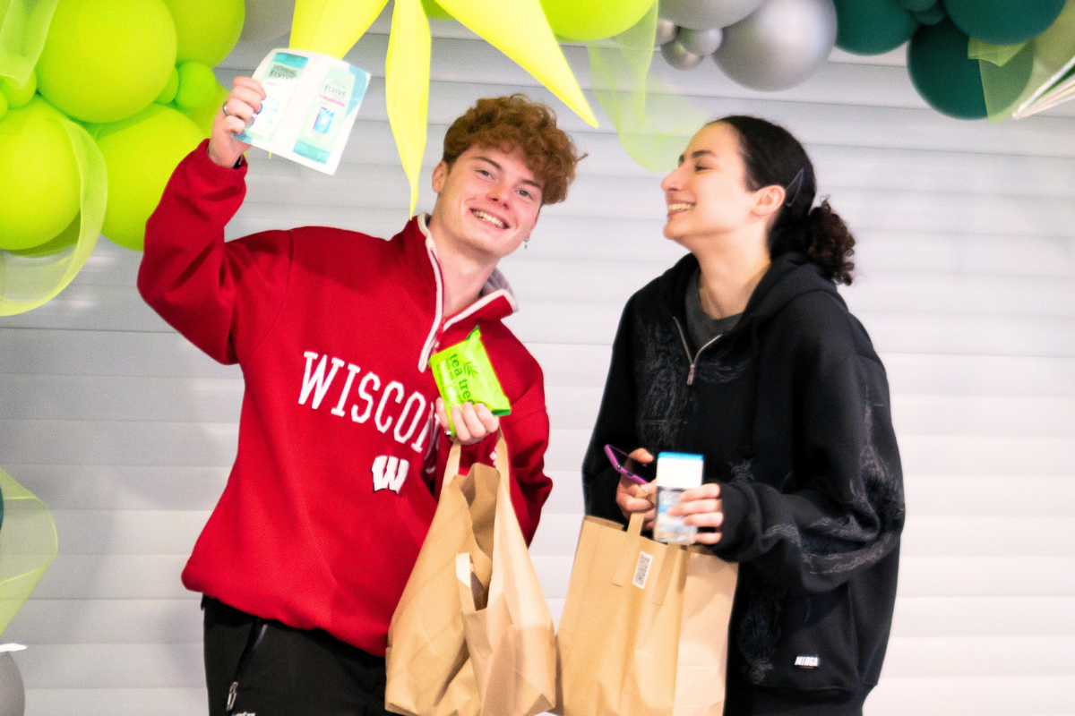 Two Code tenants showcasing what they got from our grab n go pamper day event in 2024