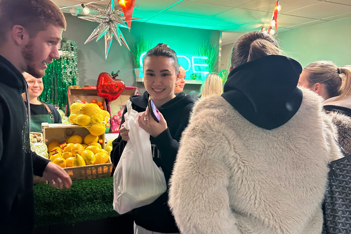 Tenants queuing up to grab some fruit and veg