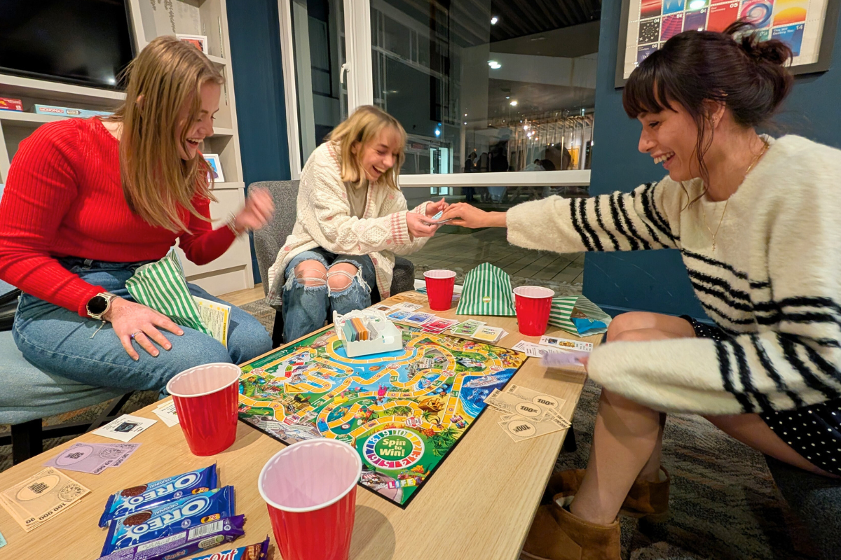 Three CODE tenants playing a game together at our games night event in Coventry