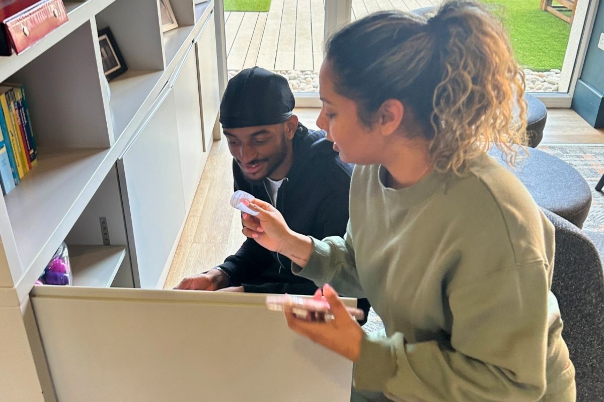 Tenants finding the first clue in the cupboard