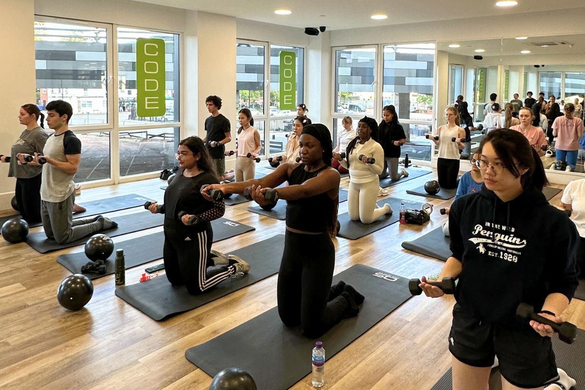 Students attending the pilates event
