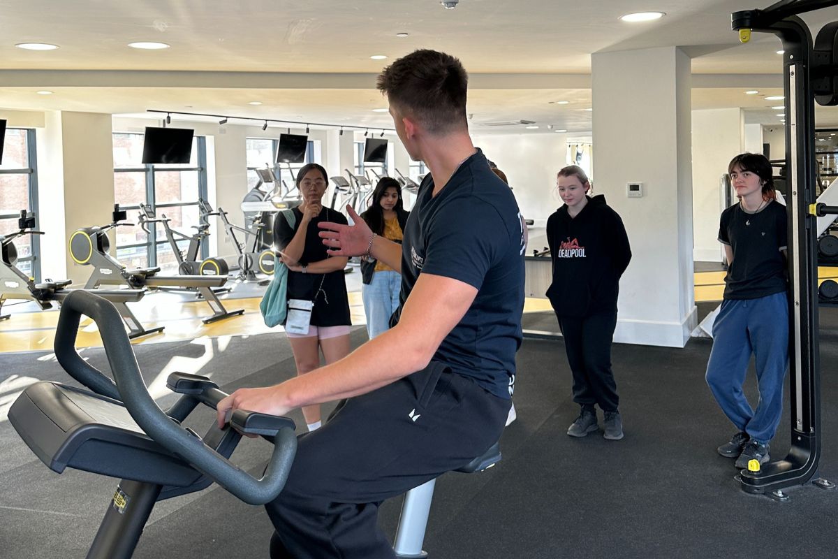 Personal trainer showing the exercise for out students