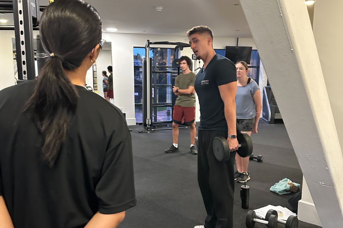 The personal trainer is showing how to do the next exercise