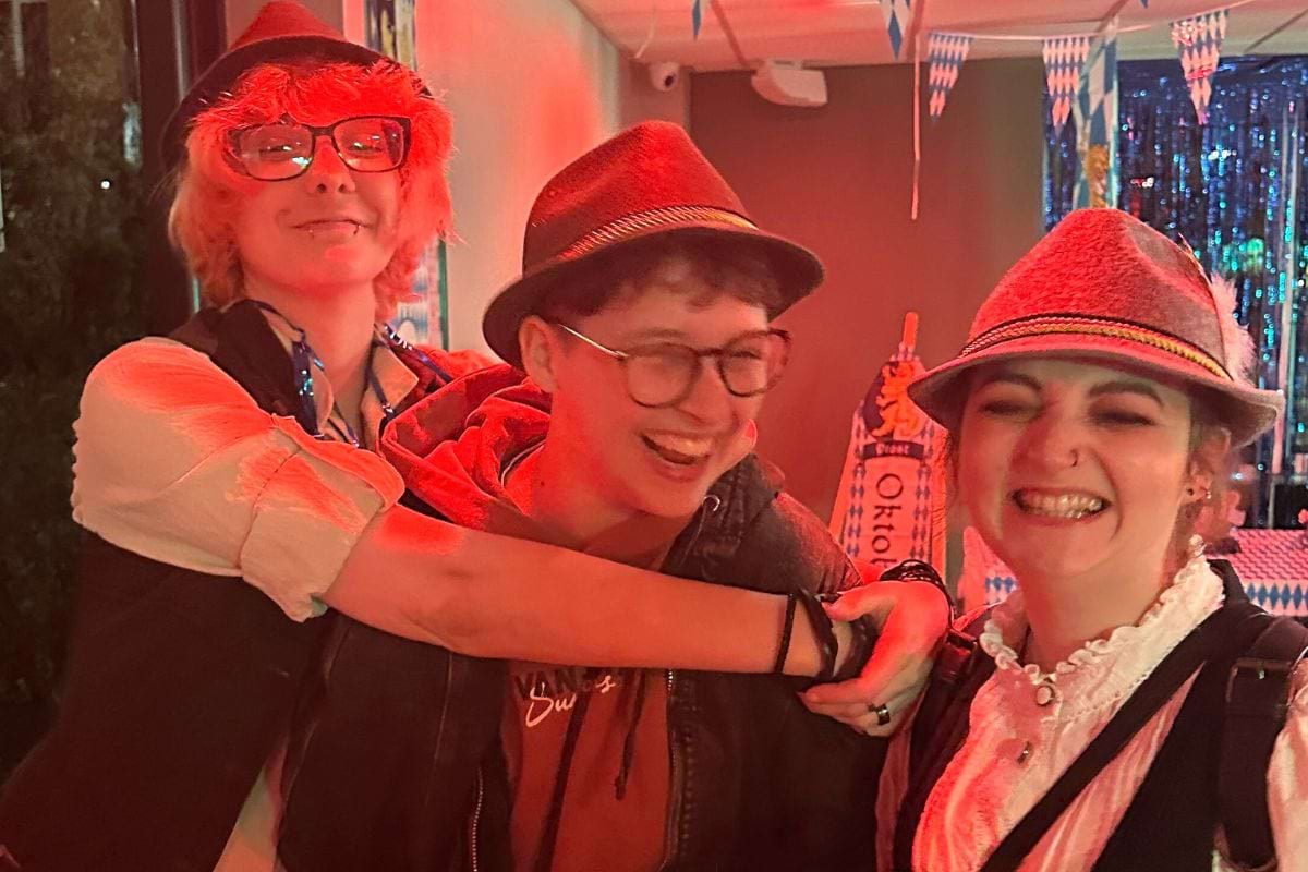 CODE student tenants laughing and having fun at Oktoberfest
