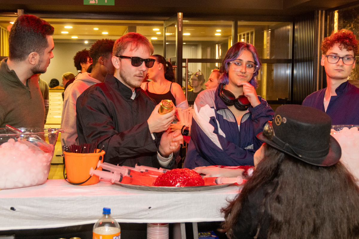 CODE tenants being served drinks at the bar
