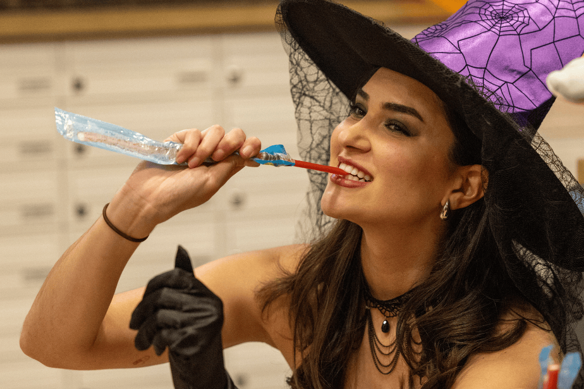 A CODE tenants enjoying sweets from the pick n mix table
