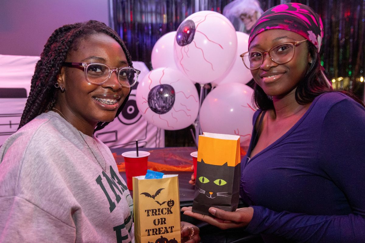 CODE tenants enjoying sweets from the pick n mix table