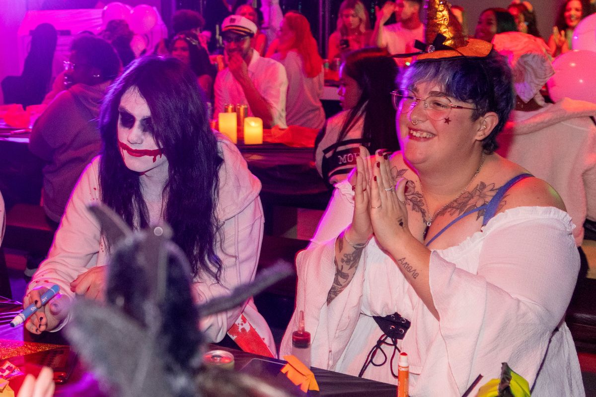 Two CODE tenants dressed up for halloween enjoying their time at bingo
