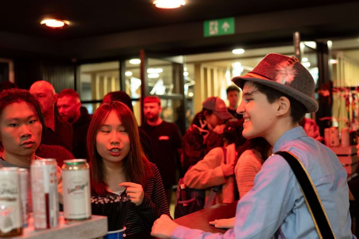 Students ordering at the bar