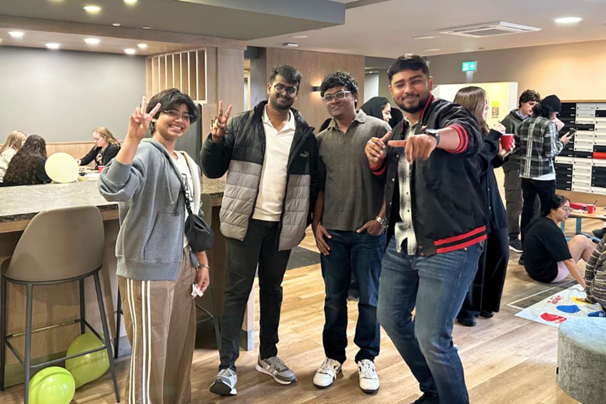 4 Code students posing for photo