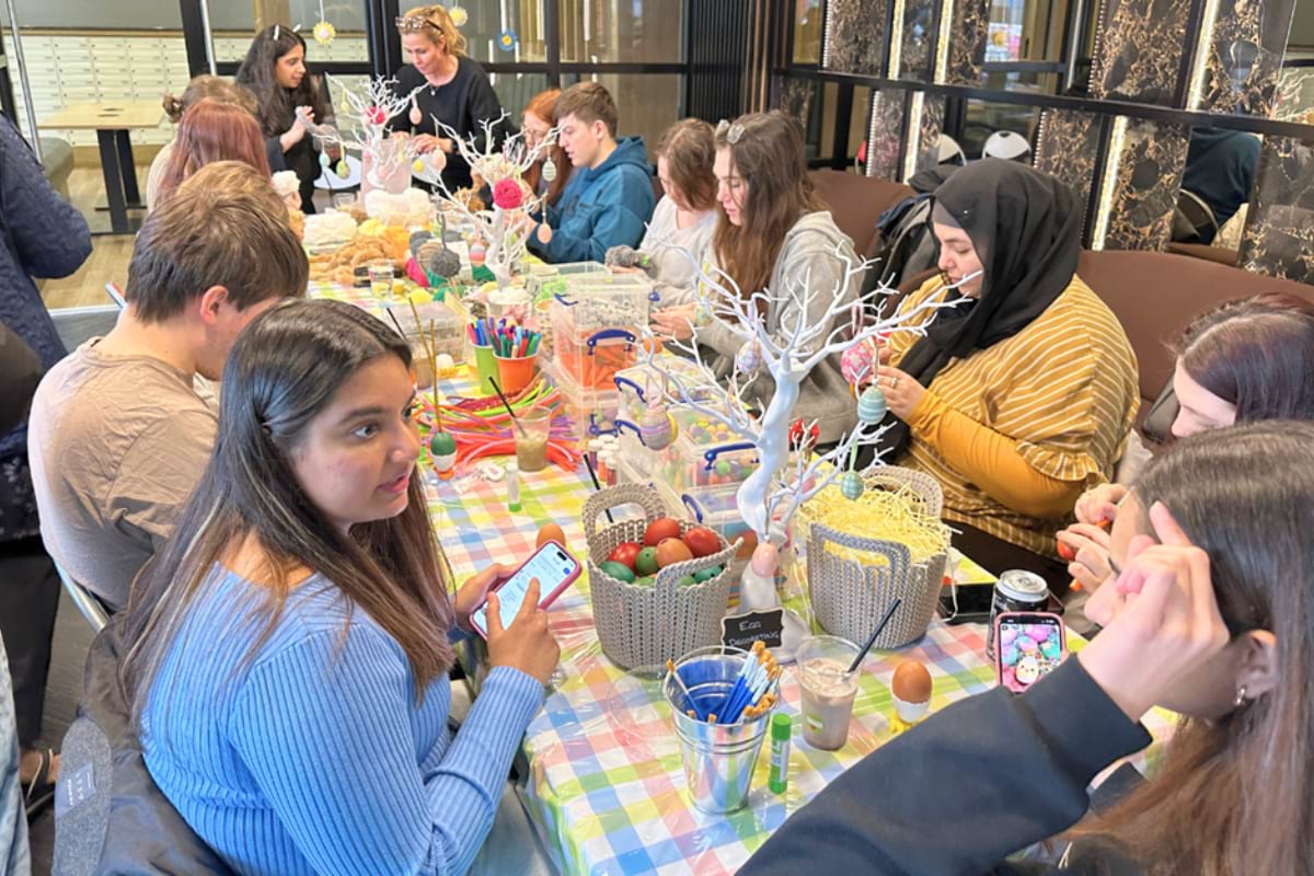 A group of tenants doing Easter arts and crafts