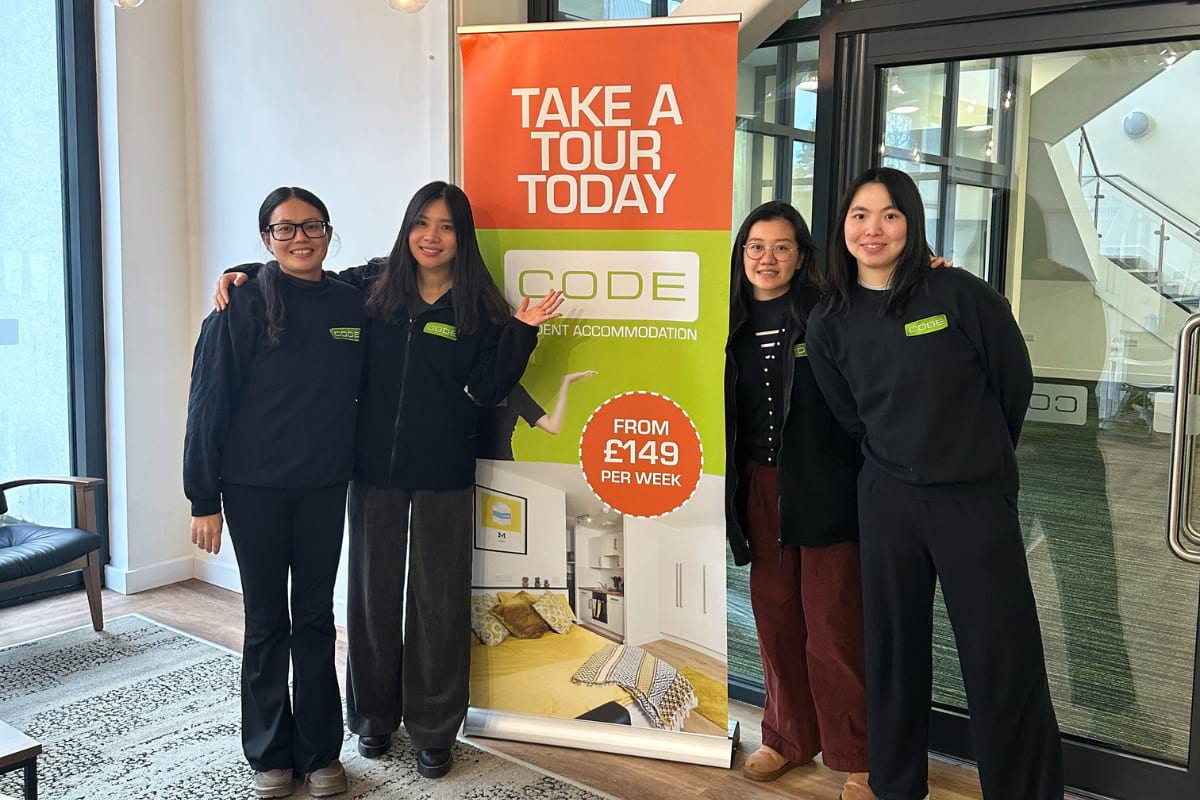 chinese staff posing for photo