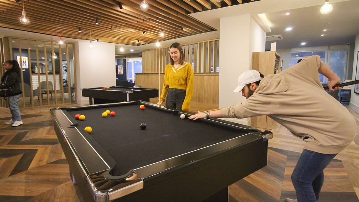 Students playing pool CODE Student Accommodation Coventry