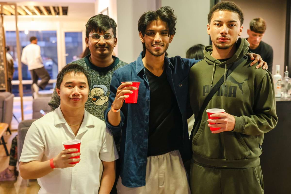 4 tenants posing for photo