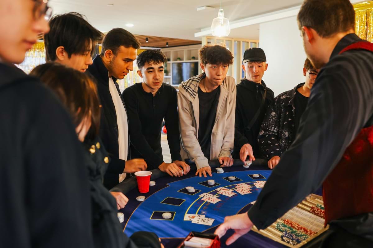 Group of boys playing black jack